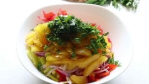 a bowl of food with greens