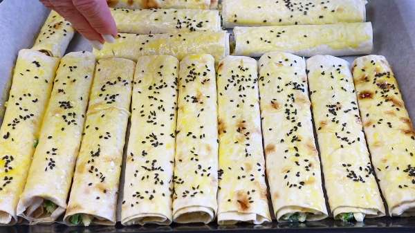 Рулетики из лаваша с яйцом сыром и луком